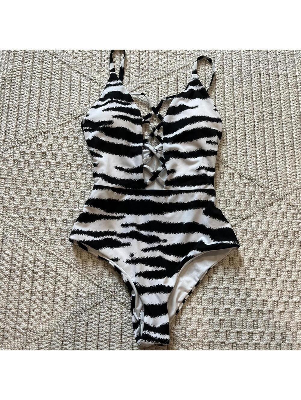 Dippin Daisy's Bliss One Piece in Zebra Print